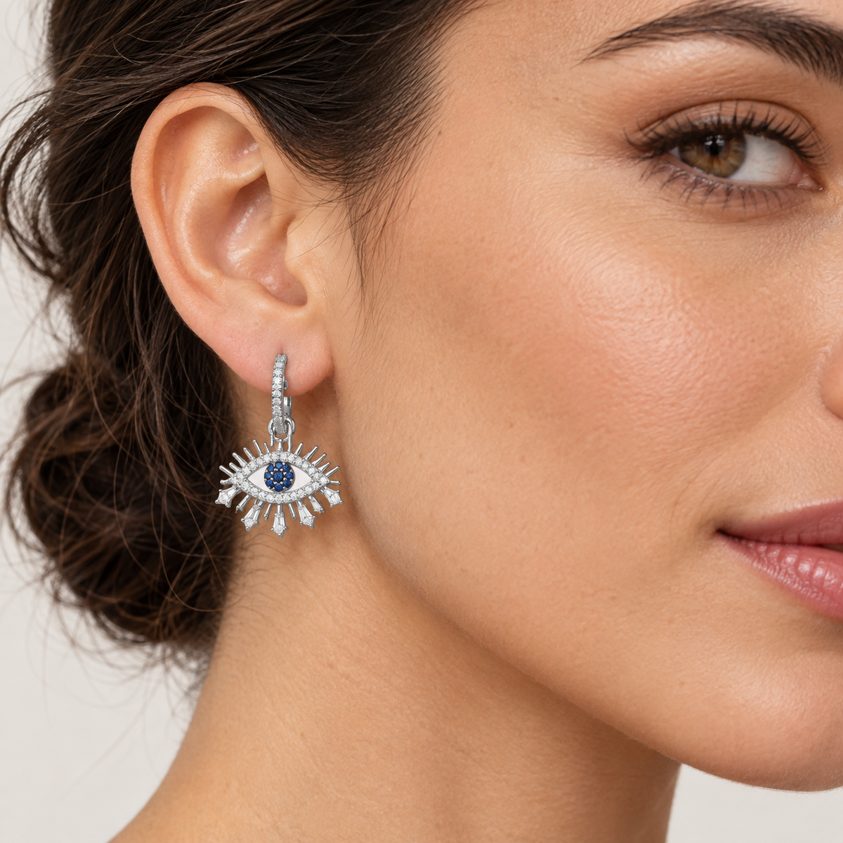 Silver Evil Eye Earrings – Anaqa — model image