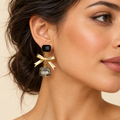 Golden Bow Statement Earrings – Anaqa — model image