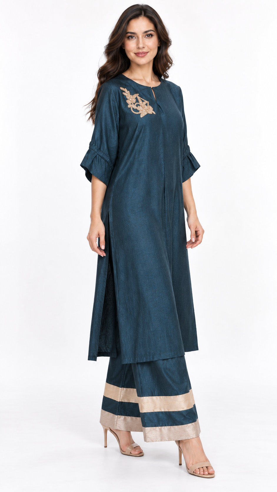 Petrol teal gold floral tunic and champagne-banded trouser set, standing pose 2