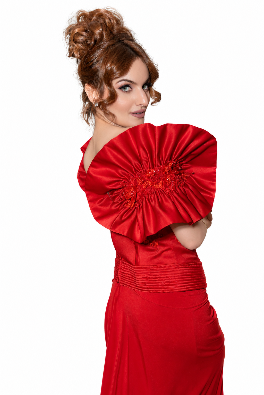 Queen B red sculptural fan corset and skirt detail on a white studio background