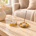 White Quartz Tealight Holder with Gold Gilding + Brass & White Quartz Incense Stick Holder styled in a home setting